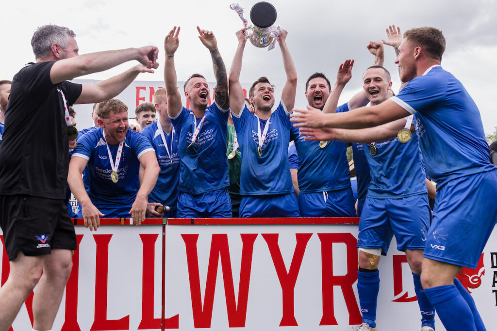 Trethomas Bluebirds celebrate winning the 2022/23 FAW Amateur Trophy Final fixture between Denbigh Town FC & Trethomas Bluebirds AFC at Latham Park, Newtown, Wales, 29 April 2023