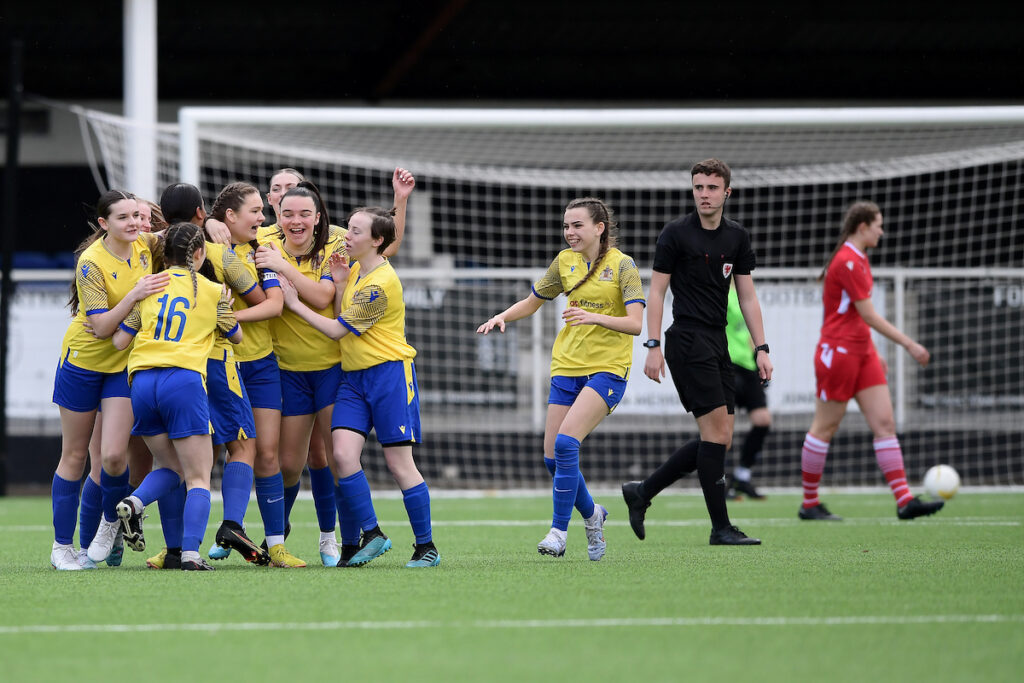 Barry Town United Ladies U16s celebrates scoring the opening goal during the 2022/23 FAW Girls Cup Final between Barry Town United Ladies U16s & Abergavenny Women U16s at Penydarren Park, Merthyr Tydfil, Wales