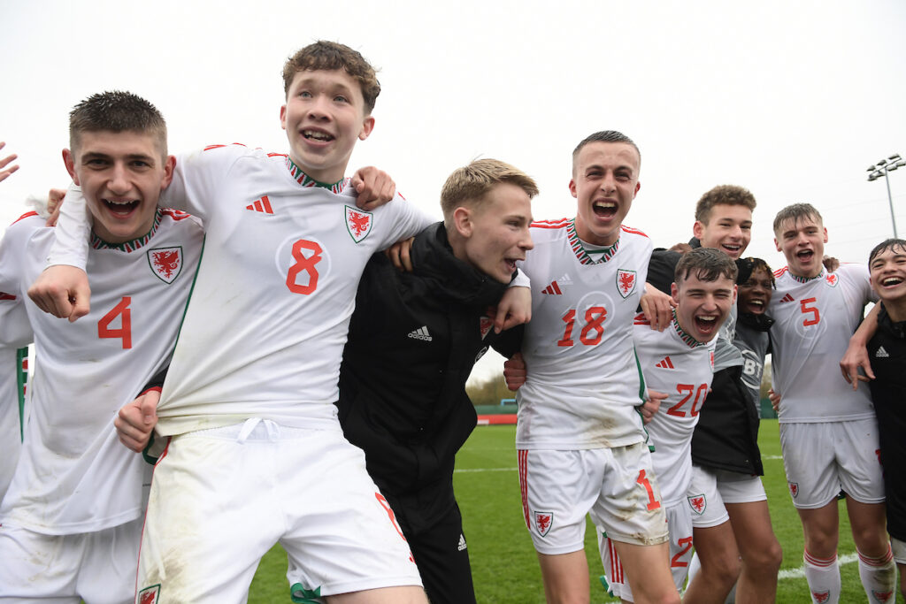 Wales celebrate at full time during the UEFA U17 Championship Qualification fixture between Wales and Montenegro at Dragon Park, Newport, Wales