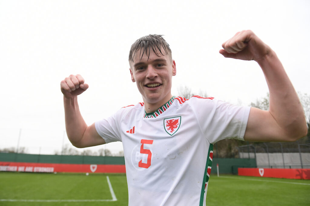 Dylan Lawlor of Wales celebrates at full time during the UEFA U17 Championship Qualification fixture between Wales and Montenegro at Dragon Park, Newport, Wales