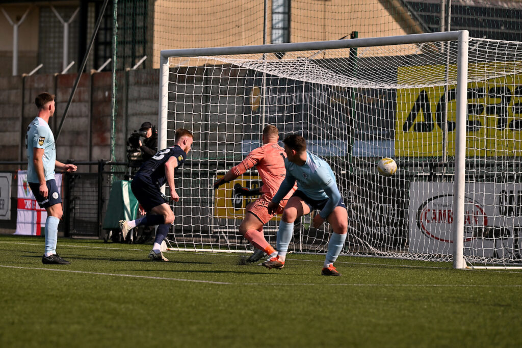 Zack Clarke of The New Saints F.C. scores his sides third goal  in the FAW Welsh Cup Semi Final Match between Cambrian United and The New Saints at Park Avenue in Aberystwyth, Wales